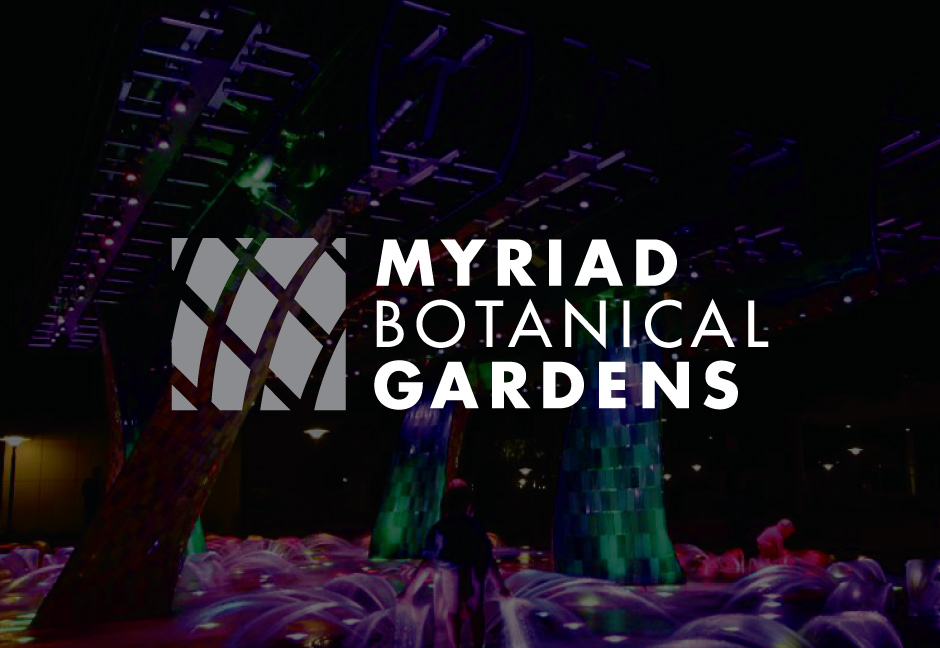 myriad botanical gardens logo over photo of myriad gardens illuminated at nighttime