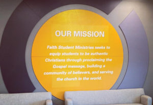 Faith Student Ministries mission signage in new dedicated space