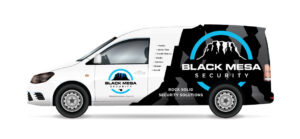Black Mesa Security vehicle wrap van divided in black and white with blue enhancements showcasing company log and contact information.