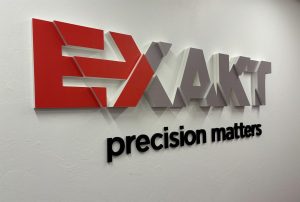 This 3D logo installation for Exakt Technologies has three layers and is a creative approach by Hester Designs