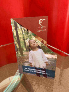 Die cut invitation card for Hearts for Hearing has a special angle cut.