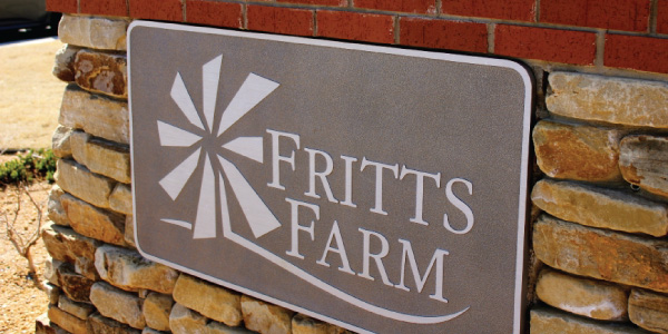 Fritts Farm physical sign reflecting branding design by Hester Designs