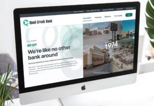 Quail Creek Bank about us page displayed on iMac screen