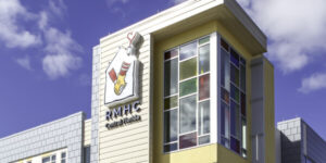 Ronald McDonald House Charities Central Florida signage on a yellow building.