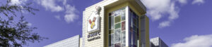 Ronald McDonald House Charities signage on a yellow building.