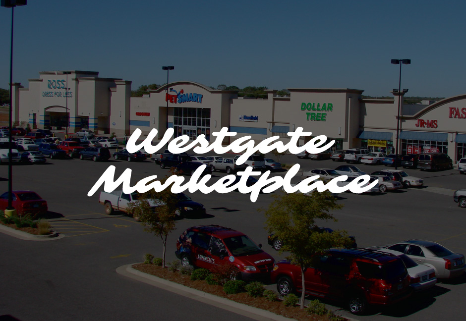 Westgate Marketplace logo with decorative background
